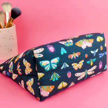 Load image into Gallery viewer, Navy Butterflies and Bugs Large Makeup Bag.
