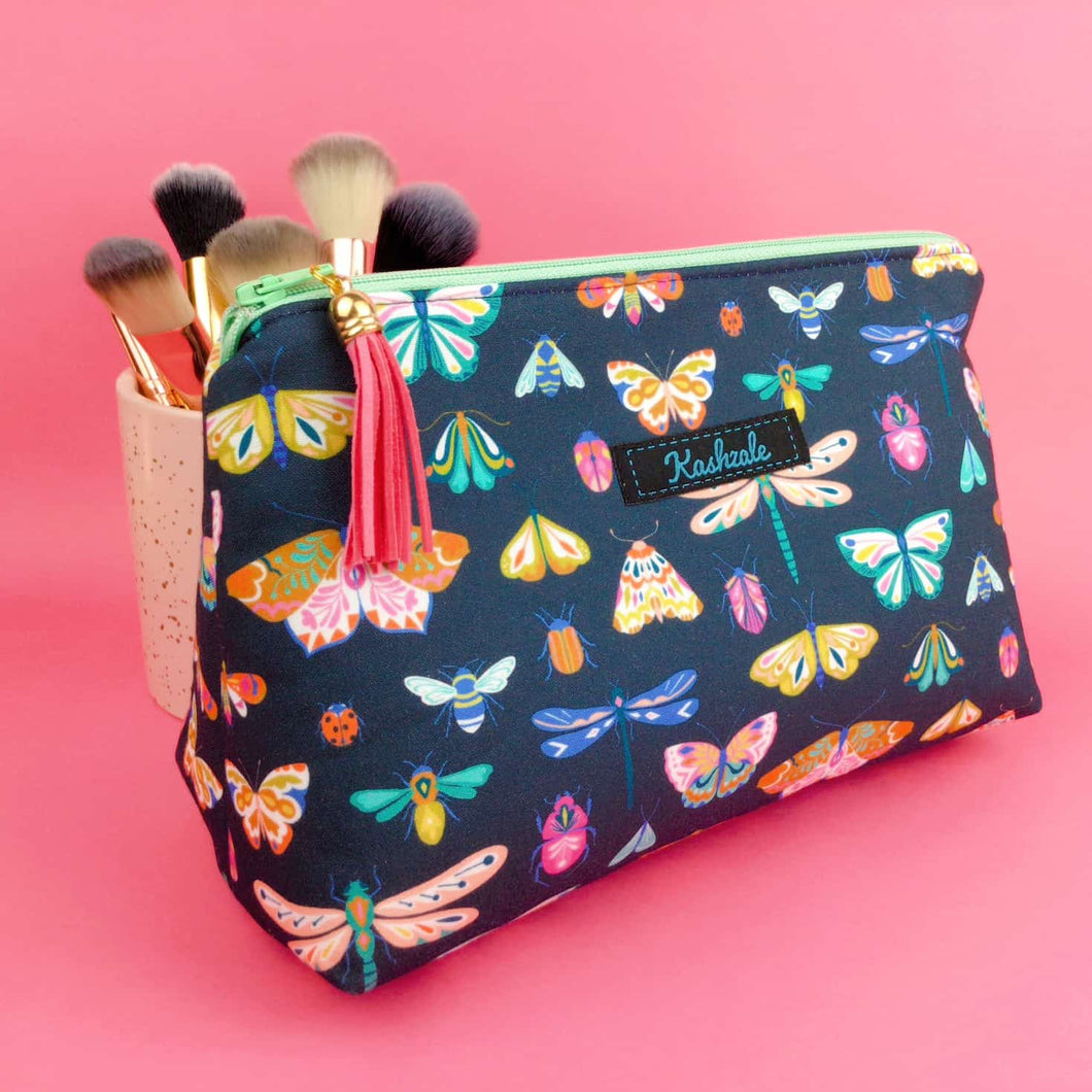 Navy Butterflies and Bugs Medium Makeup Bag.