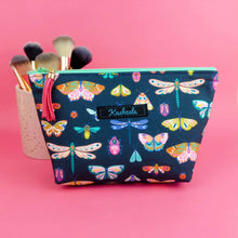 Load image into Gallery viewer, Navy Butterflies and Bugs Medium Cosmetic Bag.
