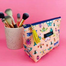 Load image into Gallery viewer, Coral Bugs and Butterflies Medium Cosmetic Bag.
