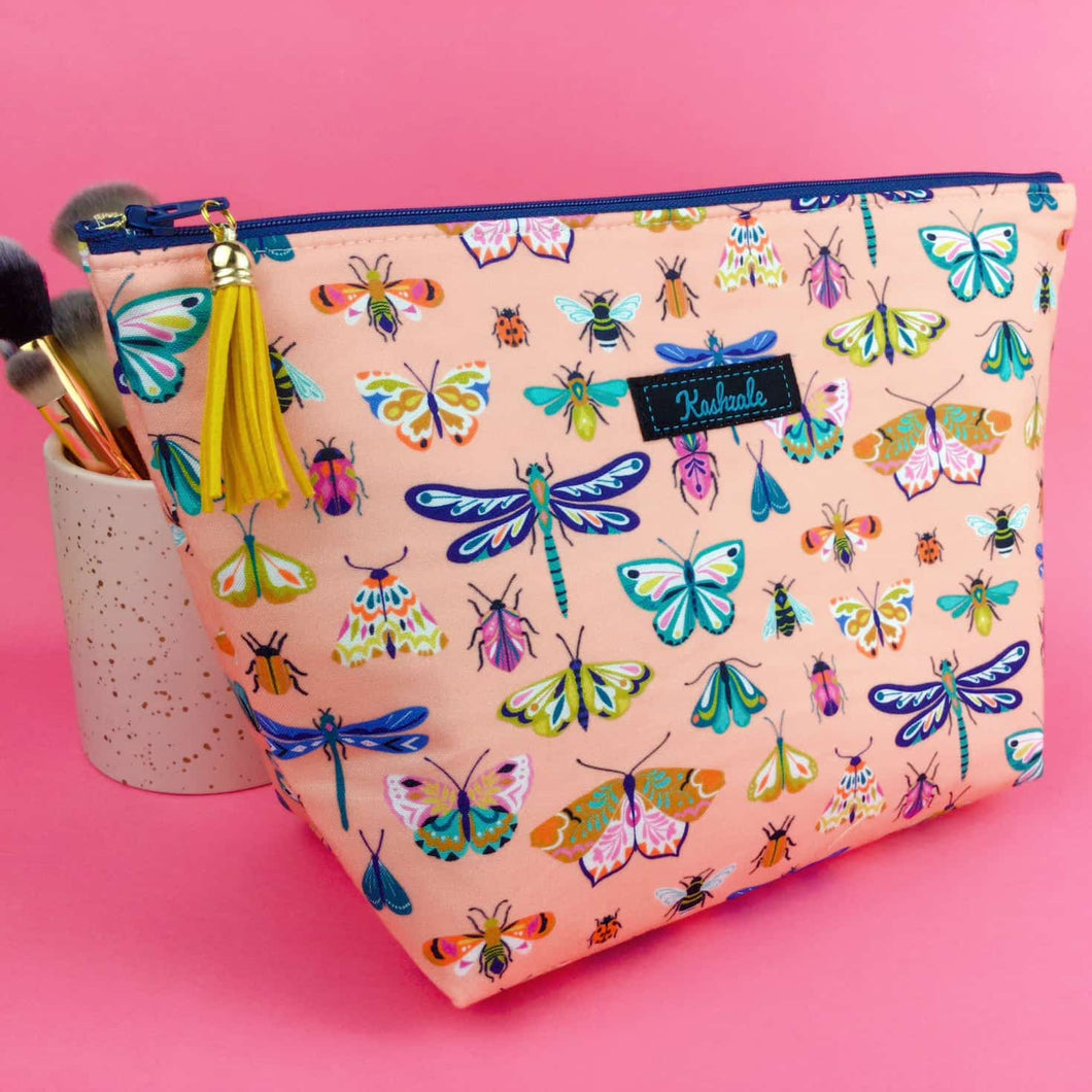 Coral Bugs and Butterflies Large Makeup Bag.