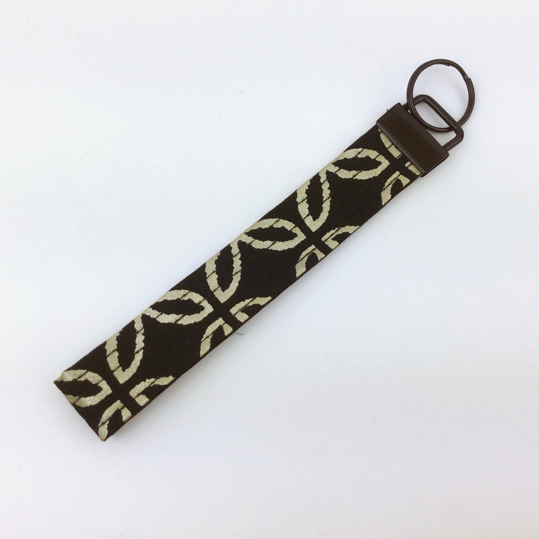 Gold and Black Clover Print Key Fob.
