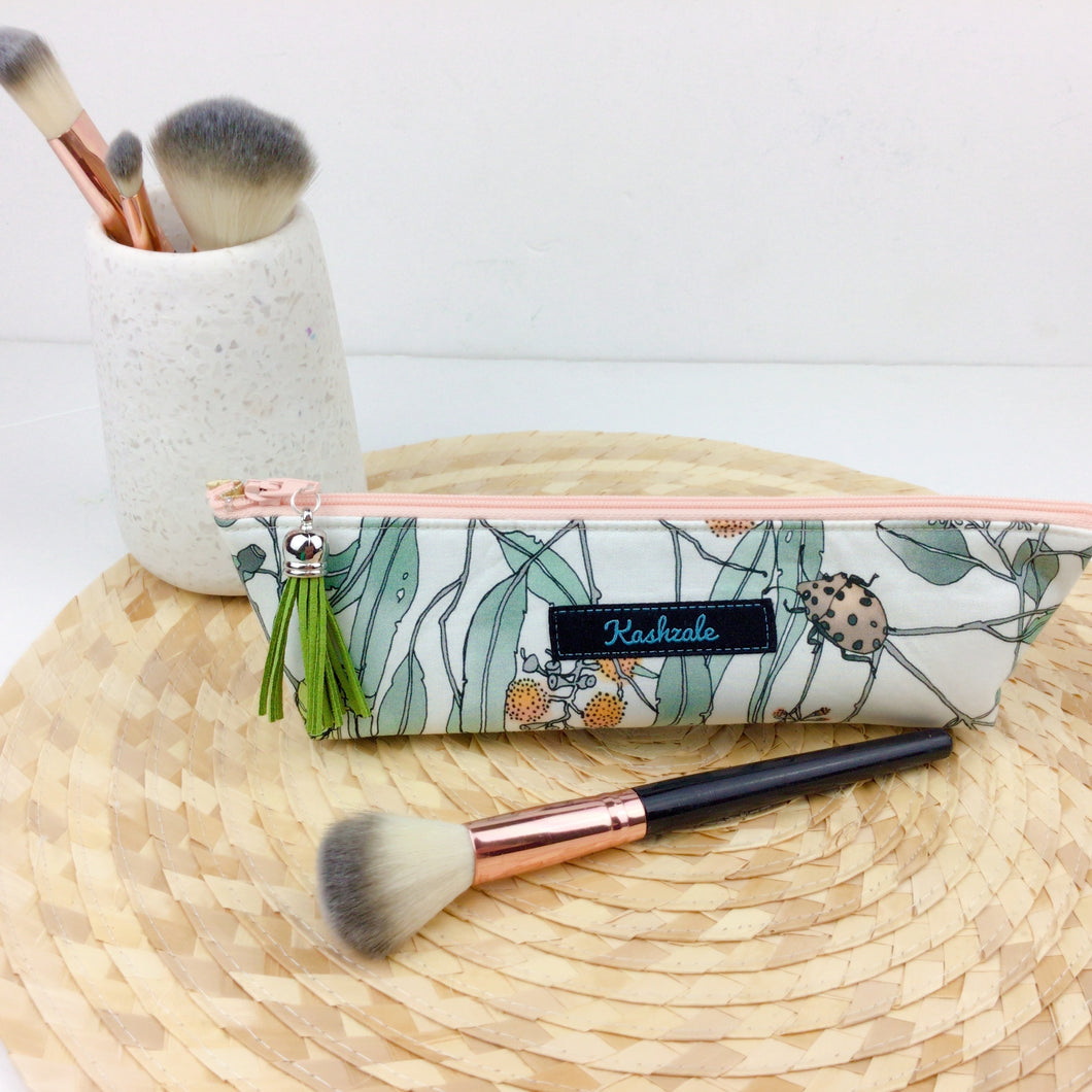 Endangered Species Makeup Brush Bag. Design by The Scenic Route.